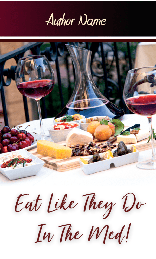 A book cover featuring a dining scene with glasses of red wine, a wine decanter, and plates of assorted food including fruits, cheese, olives, and bread on a table. The background hints at an outdoor setting. The title reads "Eat Like They Do In The Med!" and "Author Name" is displayed at the top. BookSelf Book Cover Design & Premade Book Covers