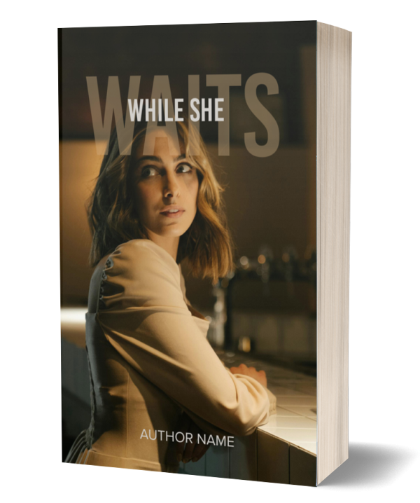 A book titled "While She Waits" features a cover image of a woman with shoulder-length wavy hair, wearing a beige long-sleeved top. She is leaning on a counter in a dimly lit setting. The author's name is written at the bottom of the cover. BookSelf Book Cover Design & Premade Book Covers