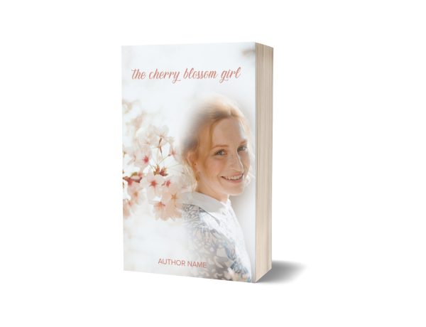 3D rendering of a book titled "The Cherry Blossom Girl." The cover features a smiling woman with light hair, wearing white and blue clothing, positioned next to blooming cherry blossoms. The author's name is printed at the bottom. The background is light, merging seamlessly with the blossoms. BookSelf Book Cover Design & Premade Book Covers