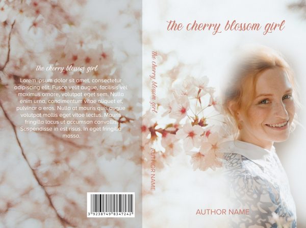 A ready-made book cover titled "The Cherry Blossom Girl: Ready Made eBook & Paperback Premade Book Cover." The right half shows a smiling woman with light red hair next to cherry blossoms. The left half has cherry blossoms in the background and generic placeholder text in a serif font. "Author Name" is indicated at the bottom in capital letters. BookSelf Book Cover Design & Premade Book Covers