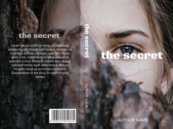 Book cover for *The Secret: Ready Made Book Cover.* The design features a close-up of a woman's face, partially hidden by a tree trunk, with an intense gaze. The title "the secret" is written in white lowercase letters. The spine displays the same title vertically. Placeholder text and "Author Name" are on the back.
 BookSelf Book Cover Design & Premade Book Covers