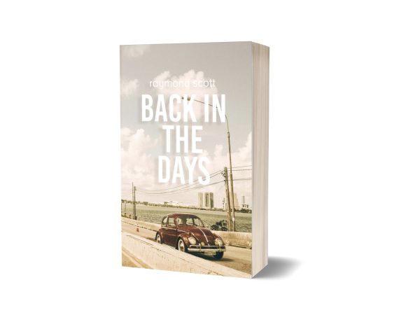 A book titled "Back in the Days" by Raymond Scott. The cover features a classic red Volkswagen Beetle driving on a road next to power lines and a concrete wall, with a cloudy sky and distant buildings in the background. The book is standing upright against a plain white background. BookSelf Book Cover Design & Premade Book Covers